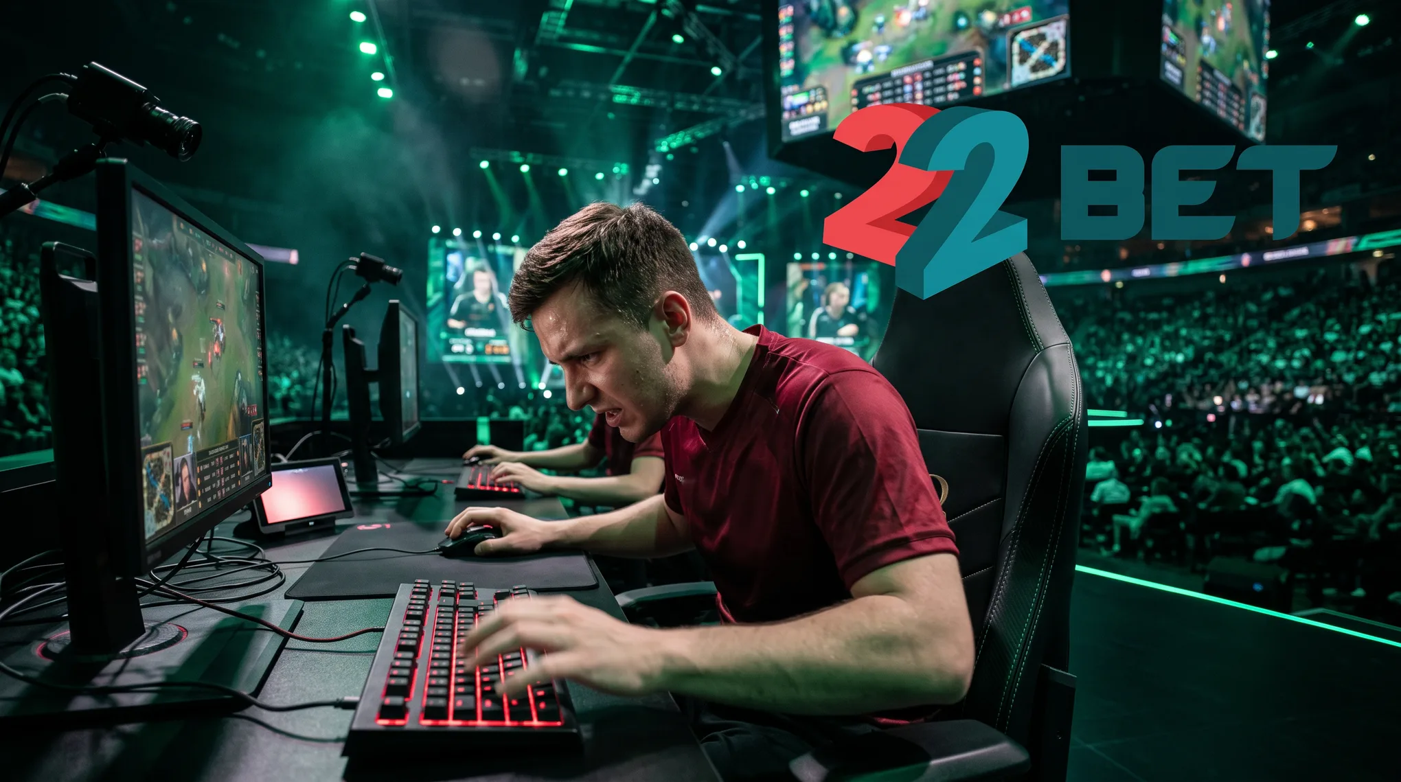 A 22Bet esports player at a tournament desk in front of the crowd